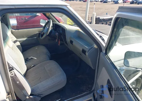 1990 Ford Ranger z USA, uszkodzony, nr VIN 1FTCR10T3LPB34273